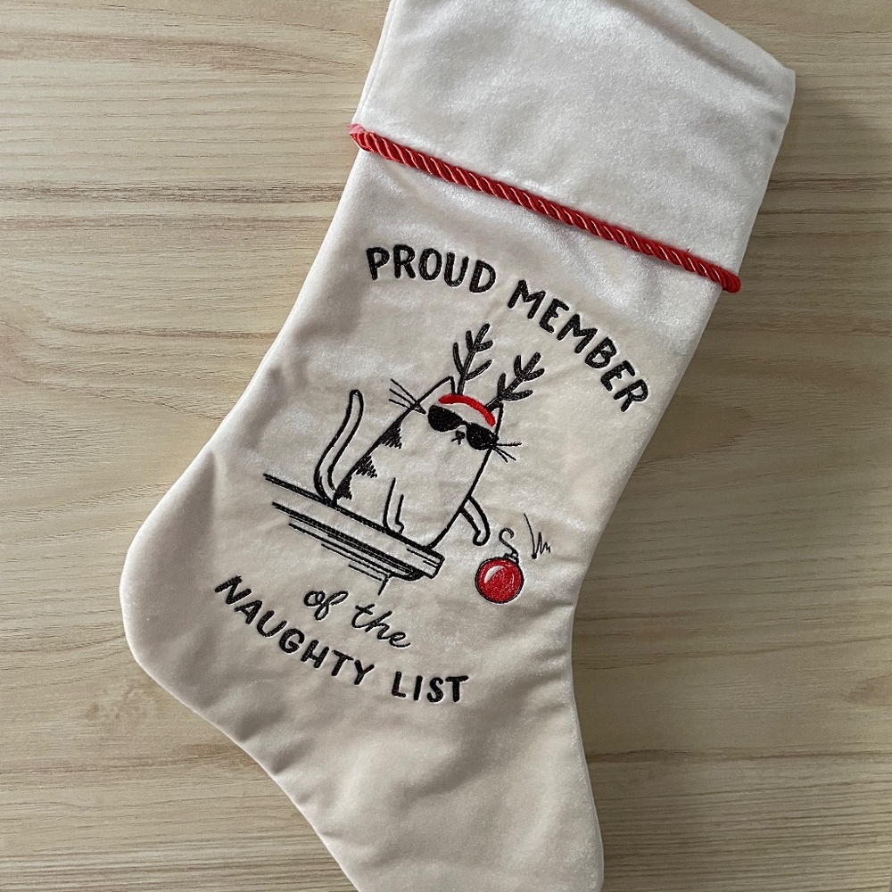 Handcrafted cat naughty list embroidered velvet Christmas stocking.